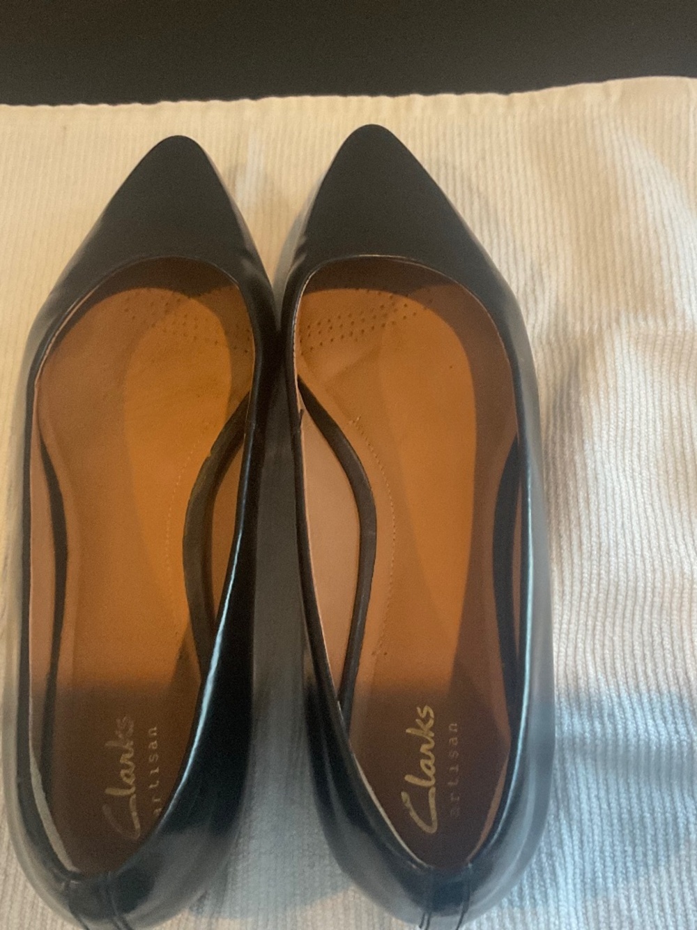 Black leather flats, size 8.5